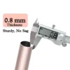0.8 mm rose gold pipe Close-up of pink gold metal curtain rod pole with highlighted text: '0.8mm thickness, sturdy and no sag' - showcasing durable construction for long-lasting performance