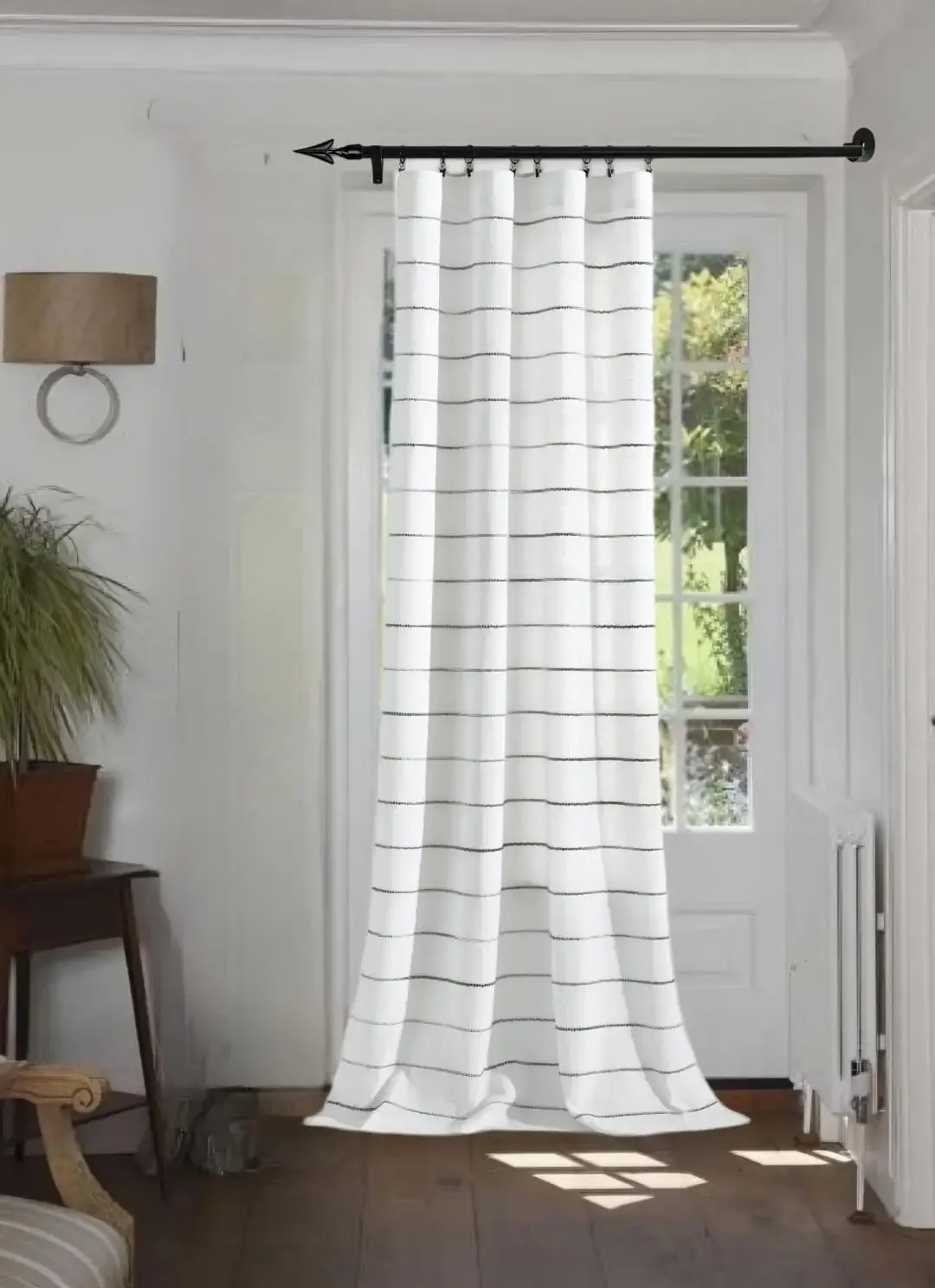 curtain pole for window against wall