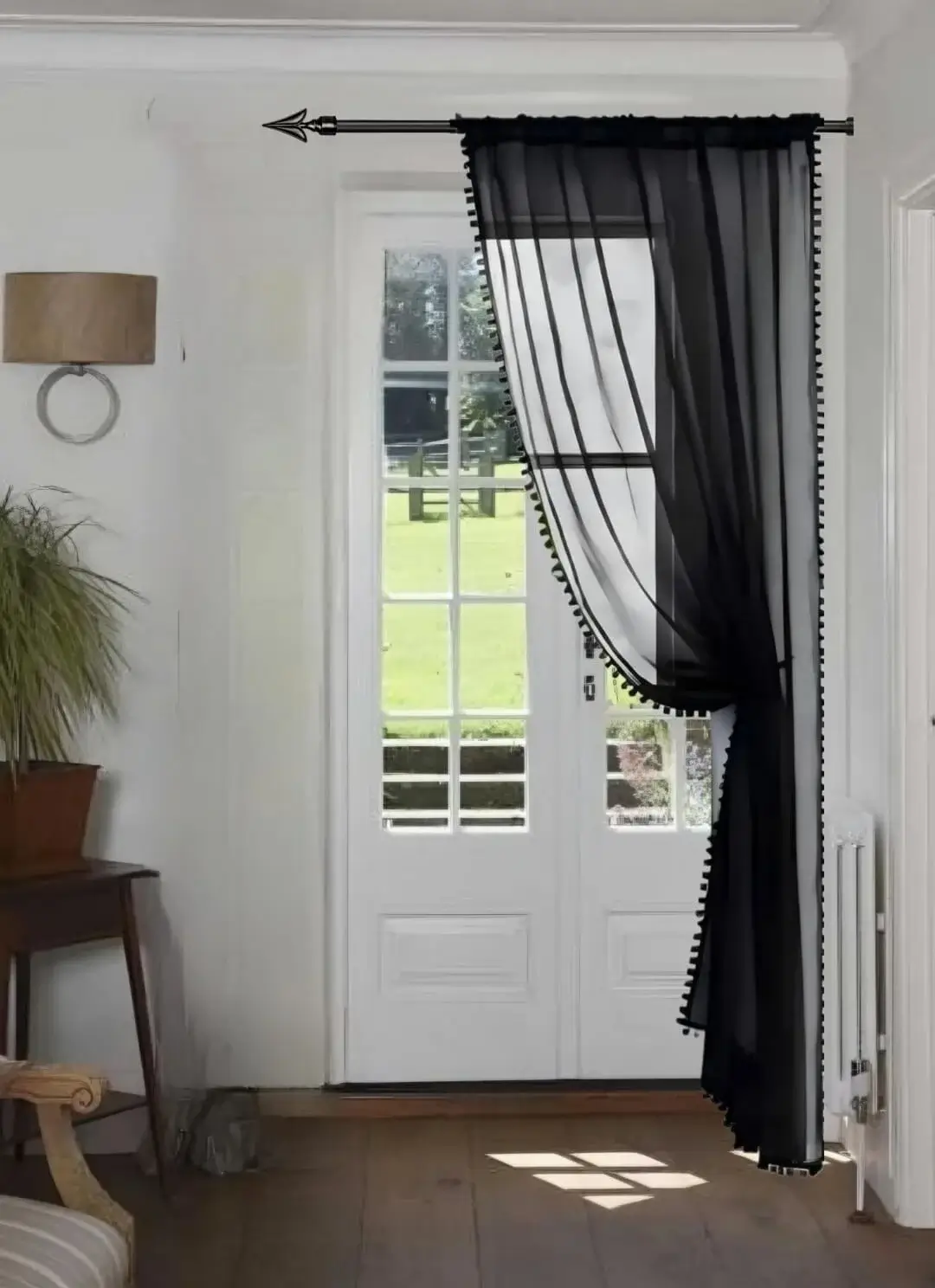 curtain pole next to wall