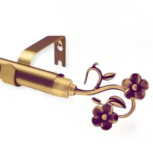 Close-up image of a premium gold-finish curtain rod featuring ornate flower-shaped finials, showcasing its opulent design for high-end interiors