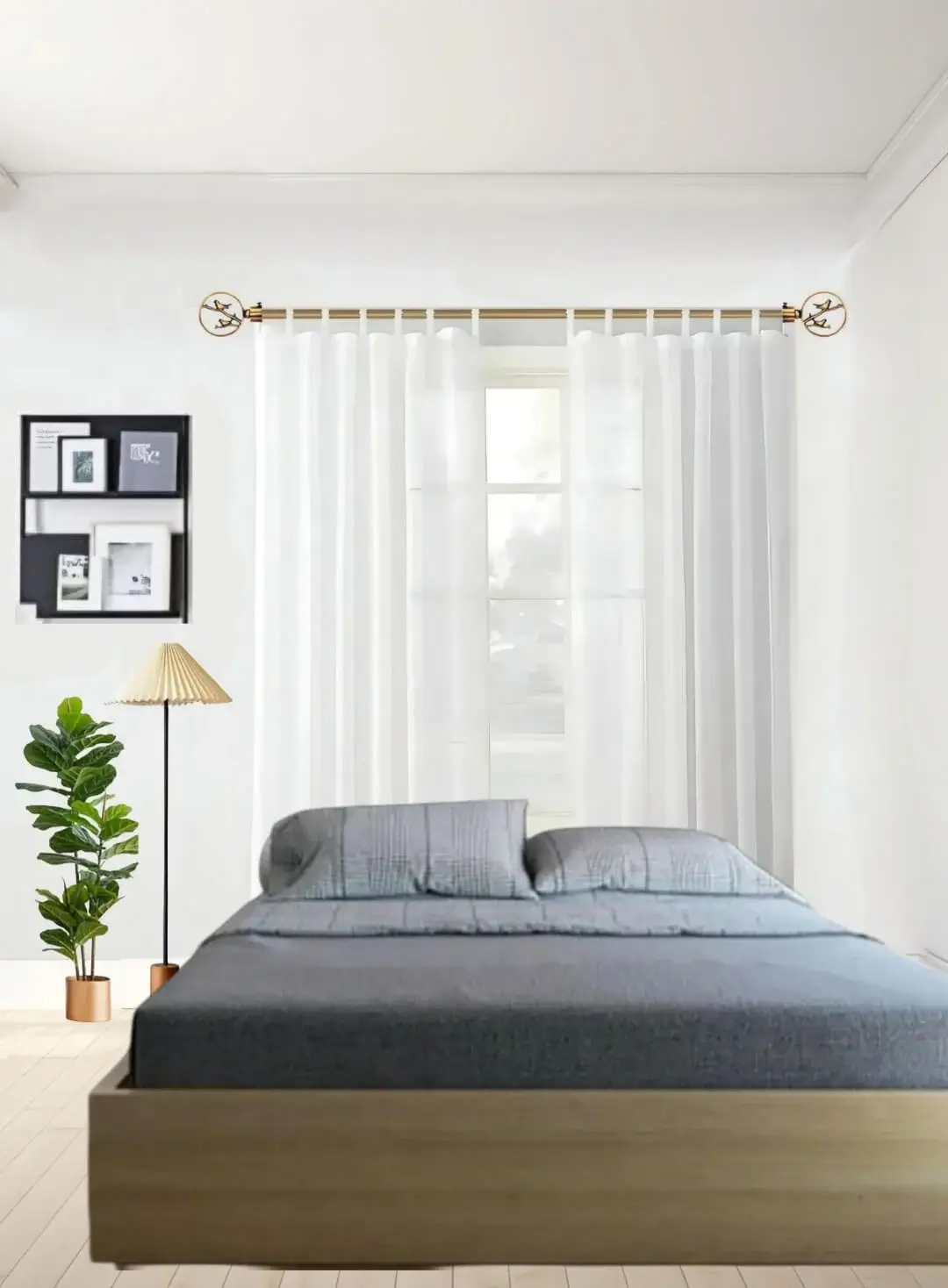 Elegant sheer curtains cascading from a luxurious gold curtain rod in a stylish bedroom, featuring a cot, wall painting, side lamp, and potted plant—creating a bright, airy, and sophisticated ambiance