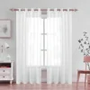 living room curtains Elegant black floor-length sheer curtains hanging from a sleek rose curtain rod installed on a window—creating a modern, flowing look while maintaining privacy and natural light