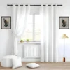 parde ka rod Elegant floor length white sheer curtain gracefully hanging from a sleek black curtain rod installed on a small window, creating an airy and sophisticated look