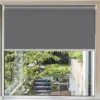 roller blinds for windows roller blinds for windows, Grey blackout roller blind installed on a window, showcasing seamless light-blocking and a sleek modern design for complete privacy and darkness