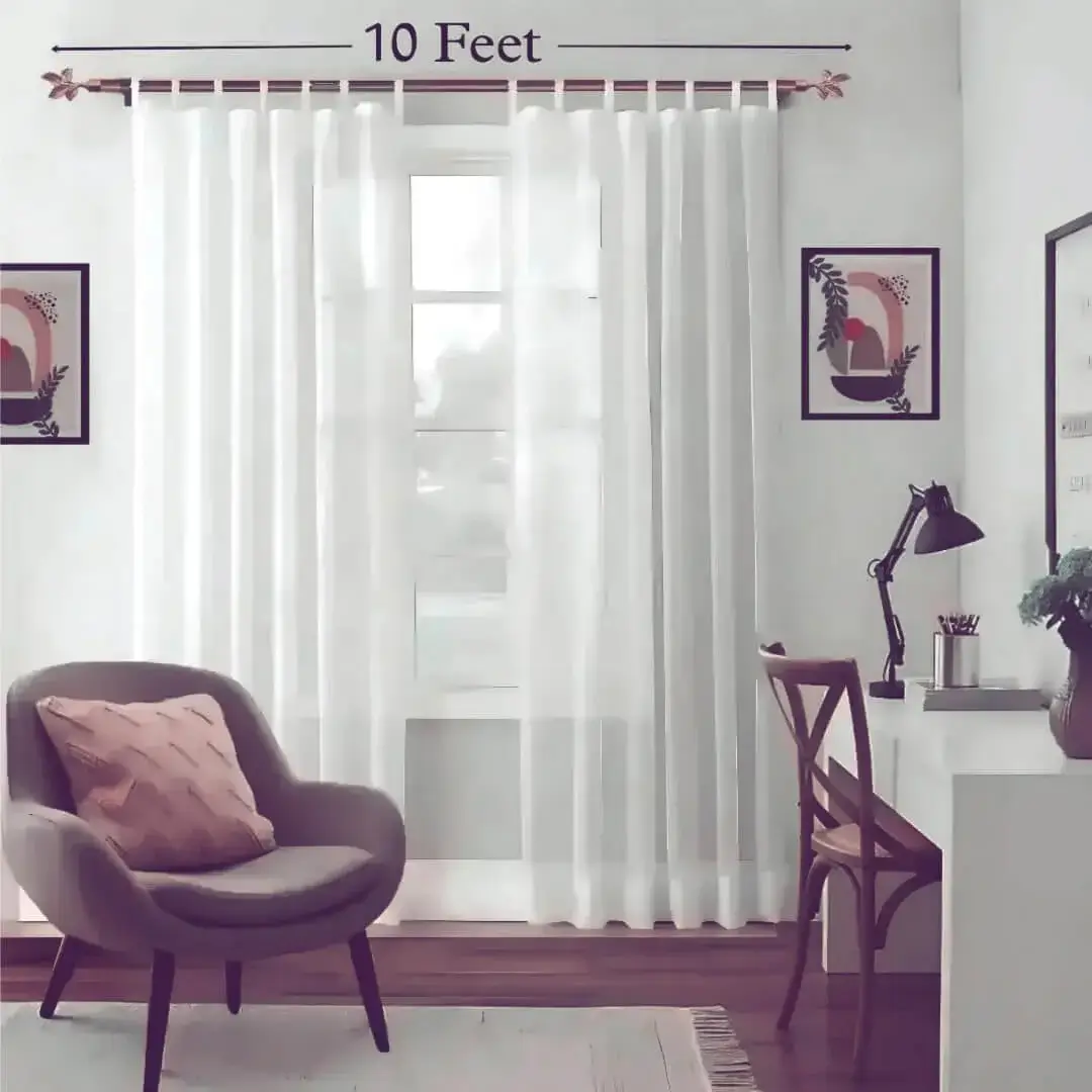 poles for voile curtains, adjustable curtain rod 10 feet, Stylish living room with flowing voile curtains on a 10 feet adjustable curtain rod rose gold finish, paired with a single seater, and a table —creating a chic, inviting ambiance.
