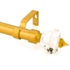 gold curtain rod with crystal ends s gold curtain rod with diamond ends, Closeup of a gold adjustable curtain rod with crystal finial end