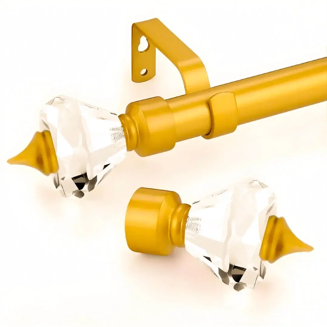 gold curtain rod with crystal ends, gold curtain pole with crystal finials, Closeup of a gold adjustable curtain rod with crystal finial end