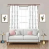 curtain rods for living hall curtain rods for home - Stylish living room with flowing white curtains on a drapery curtain rods paired with a cozy sofa set, vibrant cushions, and wall paintings—creating a chic, inviting ambiance.
