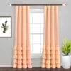 window curtains window curtains - Elegant peach curtains hanging from a sturdy curtain rod with crystal ends in a cozy living room, paired with a modern decorative wall painting for a stylish home decor setup.