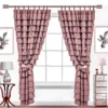 rose gold curtain rods for hall rose gold curtain rods and brackets for living room - Pink curtains on a window elegantly styled with a rose gold adjustable curtain rods set featuring a minimalist design, securely mounted with wall brackets and holder, creating a chic and inviting living room ambiance with wall art and side table, suitable for long window or door curtains.