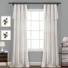 screen rods screen rods - Curtains on a window elegantly styled with a black adjustable curtain rods set featuring a minimalist design, securely mounted with wall brackets and holder, creating a chic and inviting living room ambiance with wall art and side table, suitable for long window or door curtains.